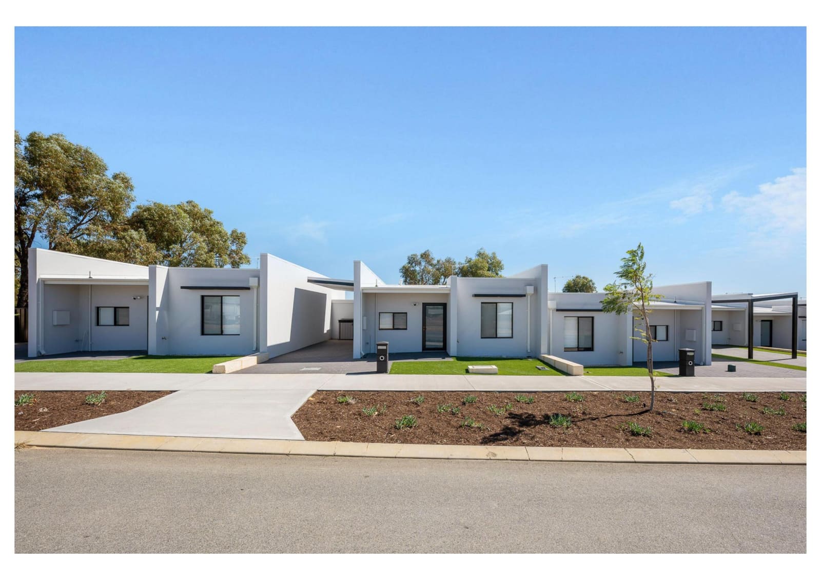Street view of modern single-storey supported accommodation villas