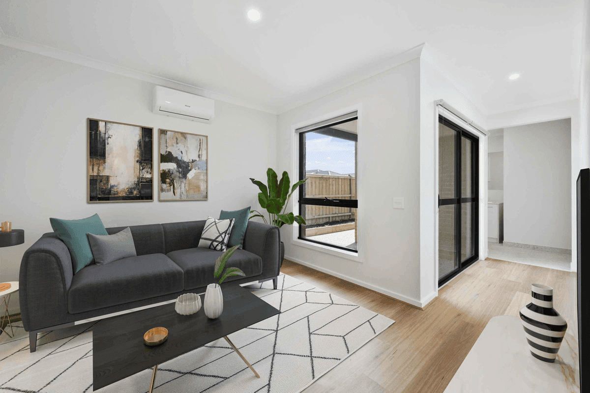 Bright furnished living room inside one of our homes